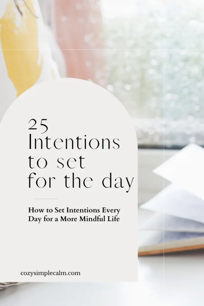 Blurred image of open book and rain splattered window - Text overlay: 25 intentions to set for the day: How to set intentions every day for a more mindful life