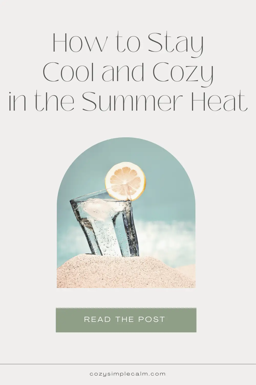 Image of glass with ice and an orange slice sitting in pile of sand - Text overlay: How to stay cool and cozy in the summer heat - cozysimplecalm.com