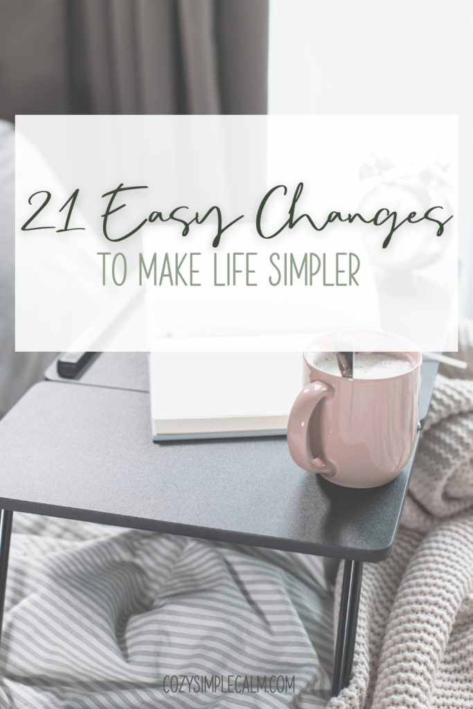 Image of coffee mug on table with cozy blanket - Text Overlay: 21 Easy Changes to Make Life Simpler - cozysimplecalm.com