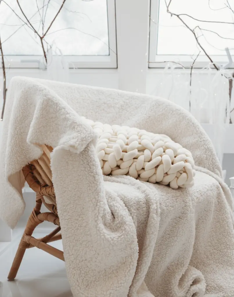 Chunky Knit White Pillow on the chair